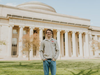 Man standing in front of building